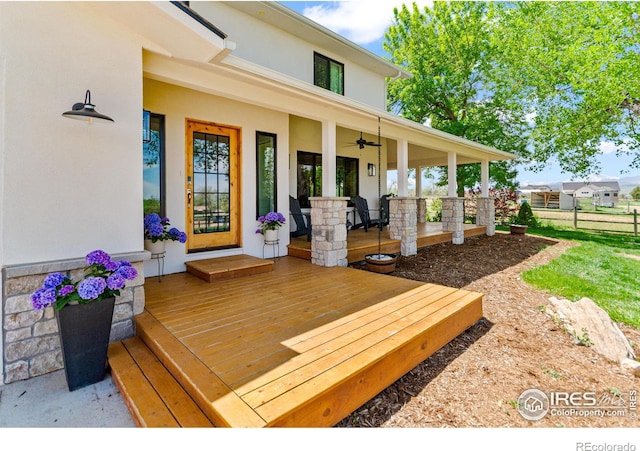 2017 Vaquero St, Longmont, CO 80504 - wooden deck featuring covered porch and ceiling fan