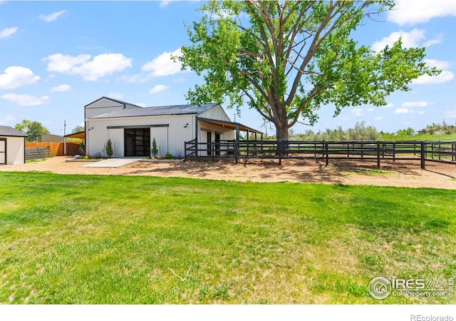2017 Vaquero St, Longmont, CO 80504 - view of yard with an outdoor structure and an exterior structure
