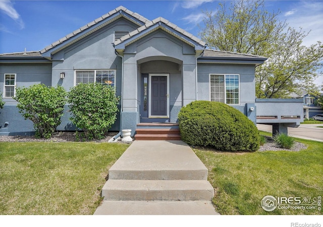 3742 Florentine Cir, Longmont, CO 80503 - single story home featuring a front yard and stucco siding