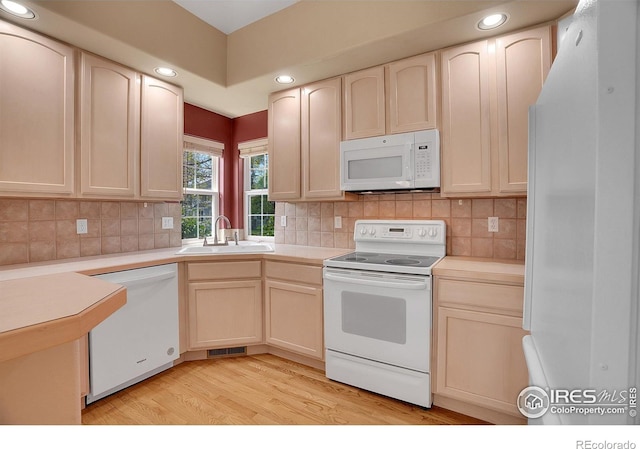 3742 Florentine Cir, Longmont, CO 80503 - kitchen featuring white appliances, a sink, light wood finished floors, recessed lighting, and light countertops