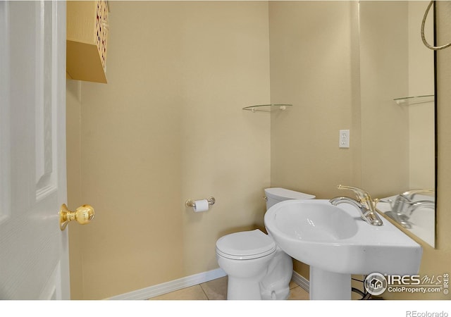 3742 Florentine Cir, Longmont, CO 80503 - bathroom with tile patterned floors, toilet, and baseboards