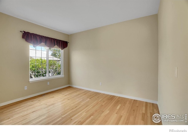 3742 Florentine Cir, Longmont, CO 80503 - empty room featuring baseboards and wood finished floors