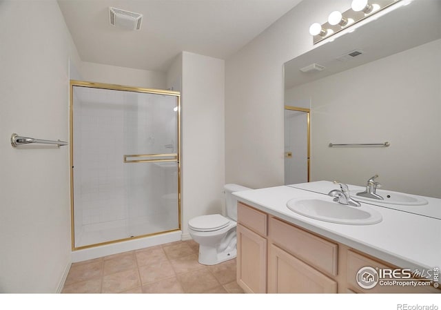 3742 Florentine Cir, Longmont, CO 80503 - full bath with a shower with door, toilet, vanity, and tile patterned flooring