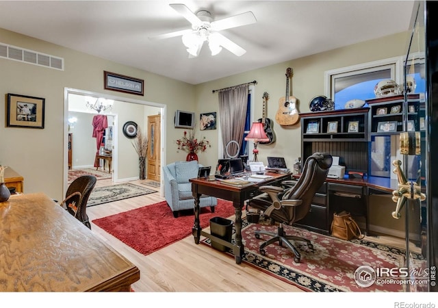office featuring wood finished floors and ceiling fan