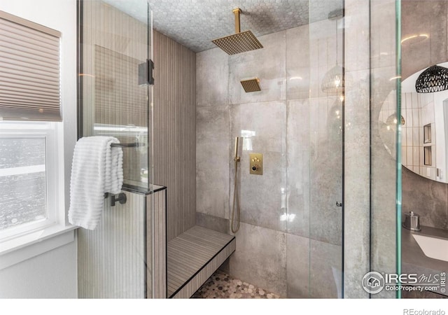 full bathroom featuring a shower stall