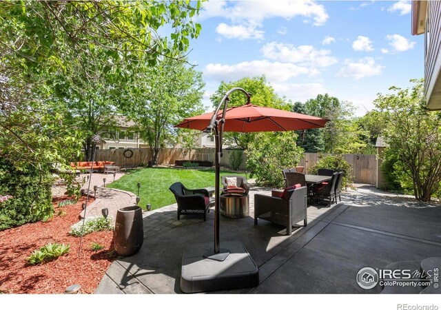 view of patio with outdoor dining space