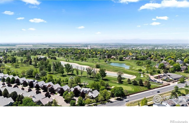 aerial view of residential area with a nearby body of water