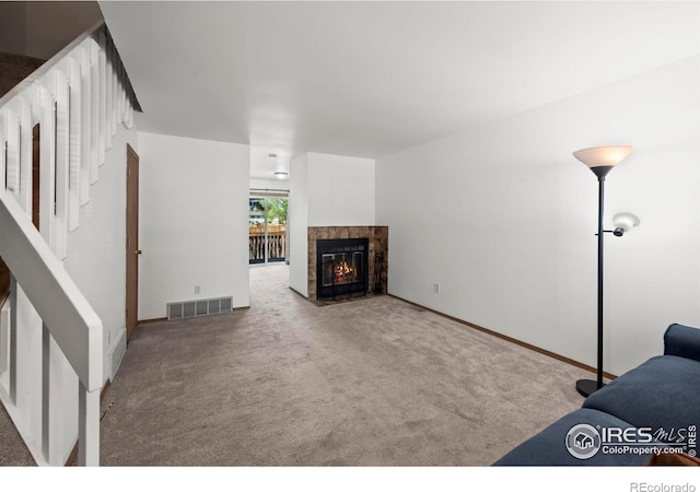 504 Shady Crest Cir, Colorado Springs, CO 80916 - unfurnished living room featuring carpet floors, a fireplace, and baseboards