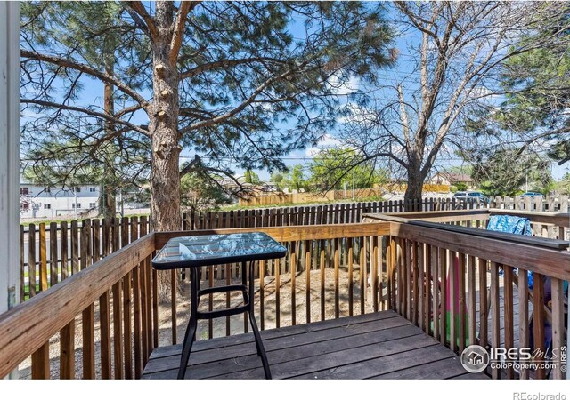 504 Shady Crest Cir, Colorado Springs, CO 80916 - deck featuring a fenced backyard