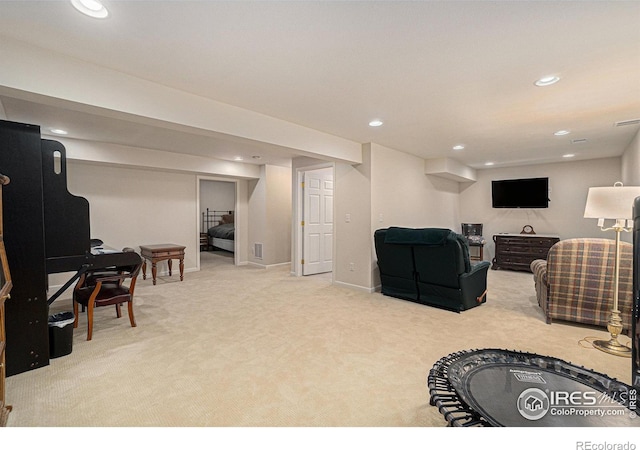 living room with carpet, recessed lighting, and baseboards