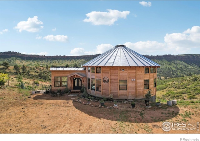 2118 Dry Creek Dr, Lyons, CO 80540 - view of front of house featuring a standing seam roof and metal roof
