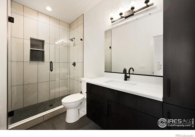 full bath with a shower stall, toilet, vanity, tile patterned flooring, and recessed lighting