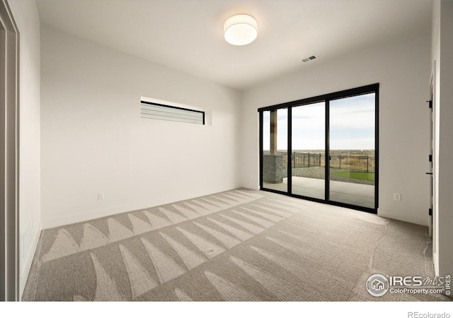view of carpeted empty room
