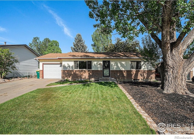 single story home featuring brick siding, an attached garage, concrete driveway, and a front lawn