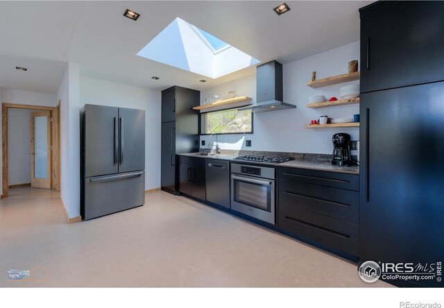 548 Coughlin Meadows Rd, Boulder, CO 80302 - kitchen with stainless steel appliances, a skylight, wall chimney range hood, open shelves, and dark cabinets