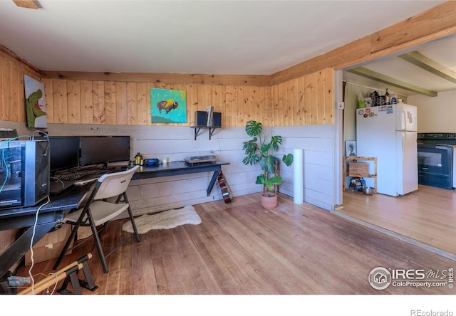 548 Coughlin Meadows Rd, Boulder, CO 80302 - home office with wooden walls and wood finished floors