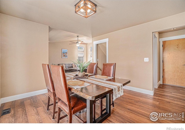 8962 Smoke Signal Way, Wellington, CO 80549 - dining room featuring baseboards, light wood finished floors, and a ceiling fan