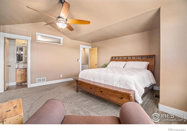 8962 Smoke Signal Way, Wellington, CO 80549 - carpeted bedroom featuring lofted ceiling, baseboards, ensuite bathroom, and ceiling fan