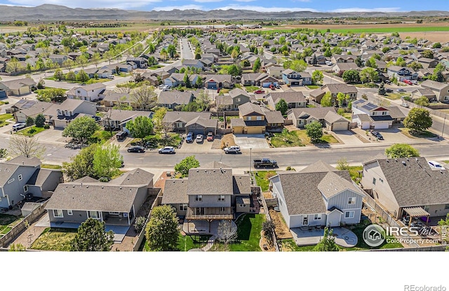8962 Smoke Signal Way, Wellington, CO 80549 - aerial view of residential area with a mountain backdrop