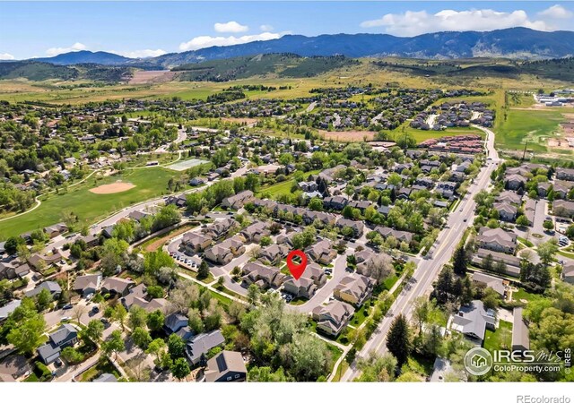 1014 Andrews Peak Dr Unit B107, Fort Collins, CO 80521 - aerial view of property and surrounding area with a mountain backdrop and nearby suburban area