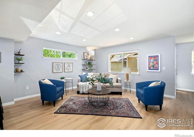 1014 Andrews Peak Dr Unit B107, Fort Collins, CO 80521 - living area featuring wood finished floors, recessed lighting, and baseboards