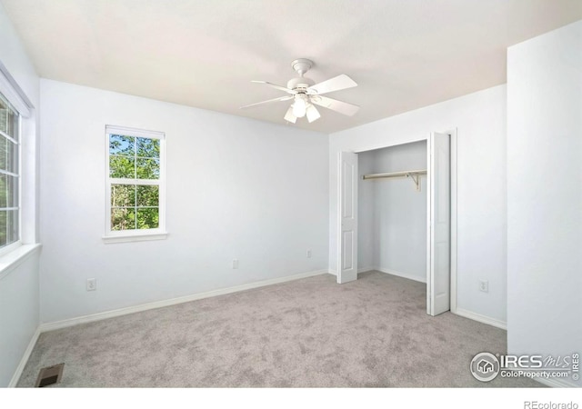 1014 Andrews Peak Dr Unit B107, Fort Collins, CO 80521 - unfurnished bedroom featuring carpet floors, baseboards, a closet, and a ceiling fan