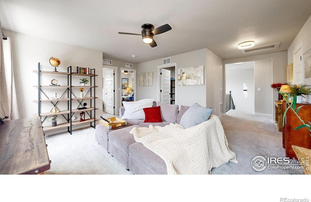 bedroom featuring carpet flooring, a ceiling fan, attic access, and baseboards