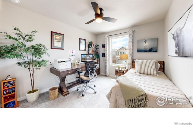carpeted bedroom featuring an office area, access to outside, baseboards, and ceiling fan