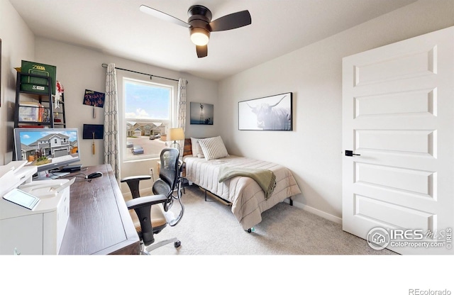 bedroom featuring carpet flooring, baseboards, and a ceiling fan