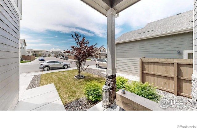 view of yard featuring a residential view