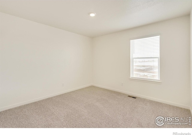 332 Hummingbird Ln, Johnstown, CO 80534 - unfurnished room featuring carpet flooring, baseboards, and recessed lighting