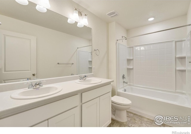 332 Hummingbird Ln, Johnstown, CO 80534 - bathroom with toilet, double vanity, tile patterned flooring, and washtub / shower combination