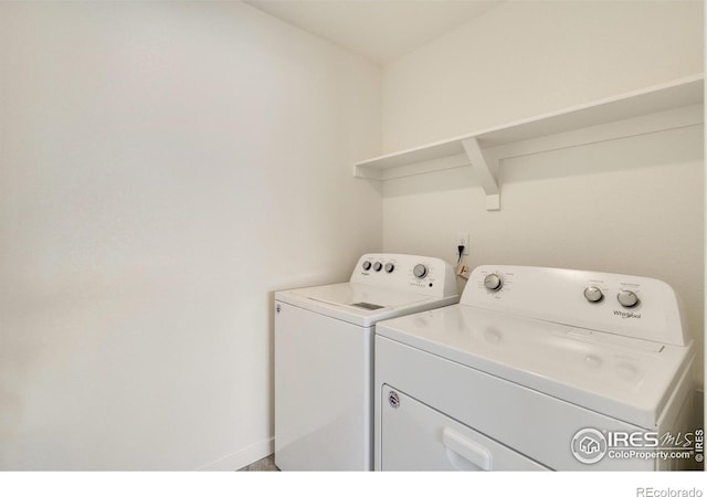 332 Hummingbird Ln, Johnstown, CO 80534 - laundry area featuring independent washer and dryer and baseboards