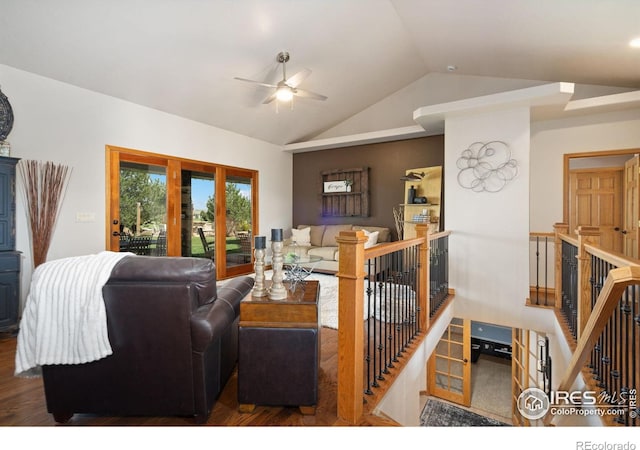 living area with vaulted ceiling, ceiling fan, and wood finished floors