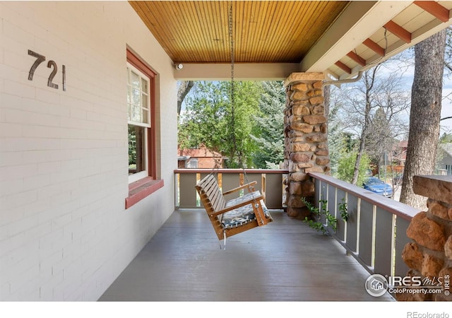 721 9th St, Boulder, CO 80302 - wooden terrace with a porch