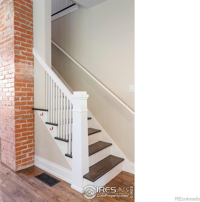 721 9th St, Boulder, CO 80302 - stairway with wood finished floors and baseboards