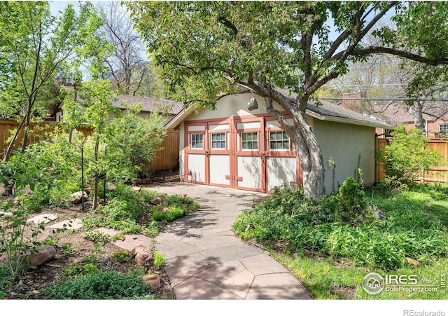 721 9th St, Boulder, CO 80302 - view of outbuilding featuring fence, an outbuilding, and driveway
