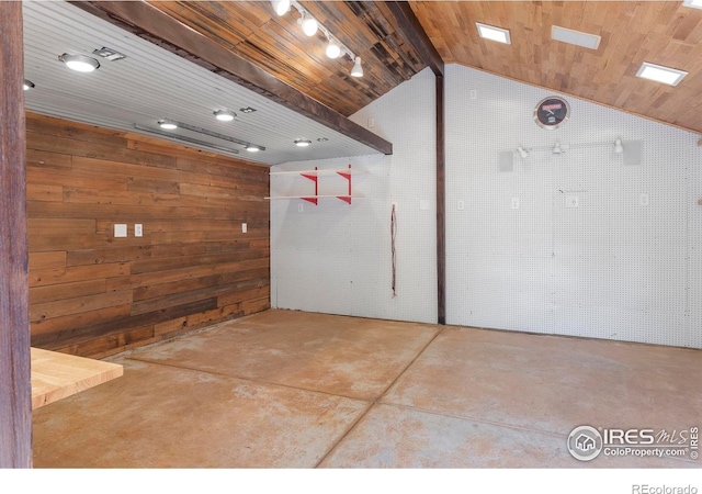 721 9th St, Boulder, CO 80302 - spare room with vaulted ceiling, wooden walls, concrete floors, and wood ceiling