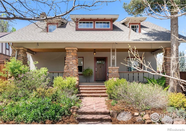 721 9th St, Boulder, CO 80302 - view of front of property with covered porch and roof with shingles