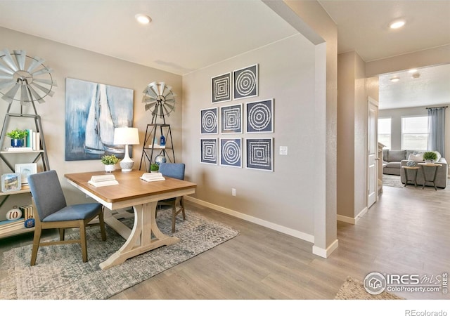 office space featuring wood finished floors, baseboards, and recessed lighting