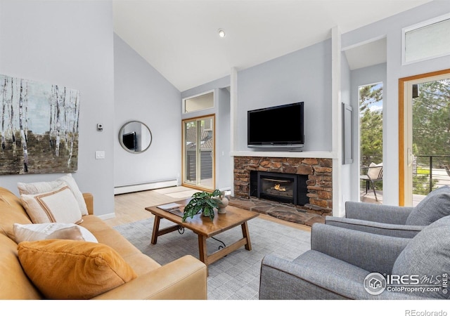3075 Galena Way, Boulder, CO 80305 - living area featuring a baseboard radiator, high vaulted ceiling, wood finished floors, and a fireplace