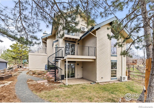 3075 Galena Way, Boulder, CO 80305 - back of property with a balcony, a patio, central AC, stairs, and a chimney