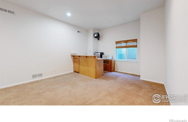 4447 Twin Peaks Dr, Loveland, CO 80537 - unfurnished office featuring light colored carpet, baseboards, and recessed lighting