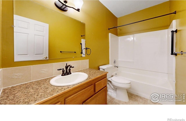 4447 Twin Peaks Dr, Loveland, CO 80537 - full bath featuring toilet, vanity, tub / shower combination, and tile patterned flooring