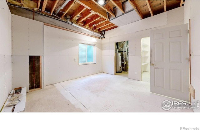 4447 Twin Peaks Dr, Loveland, CO 80537 - below grade area featuring water heater