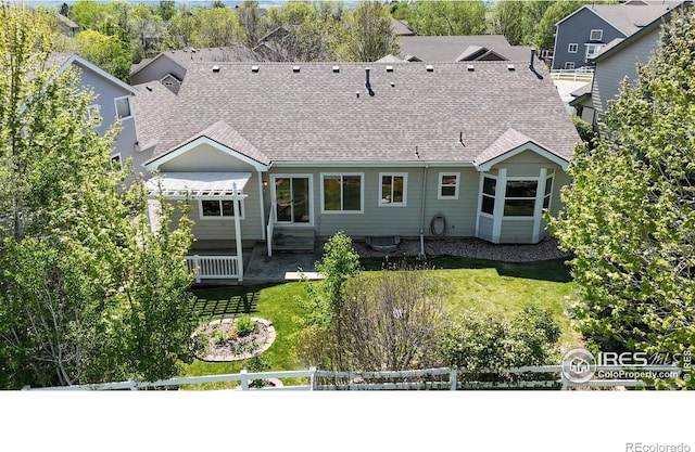 4447 Twin Peaks Dr, Loveland, CO 80537 - rear view of house featuring a pergola, a shingled roof, and a patio