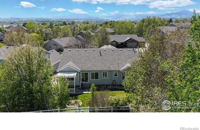 4447 Twin Peaks Dr, Loveland, CO 80537 - aerial view of property and surrounding area featuring a mountainous background