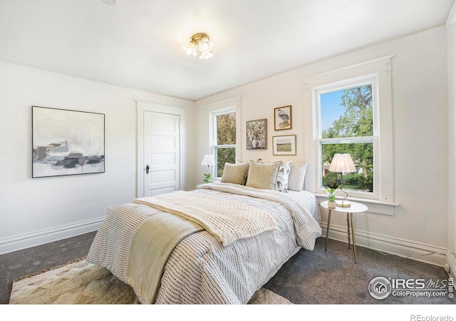 486 N Corona St, Denver, CO 80218 - carpeted bedroom featuring baseboards