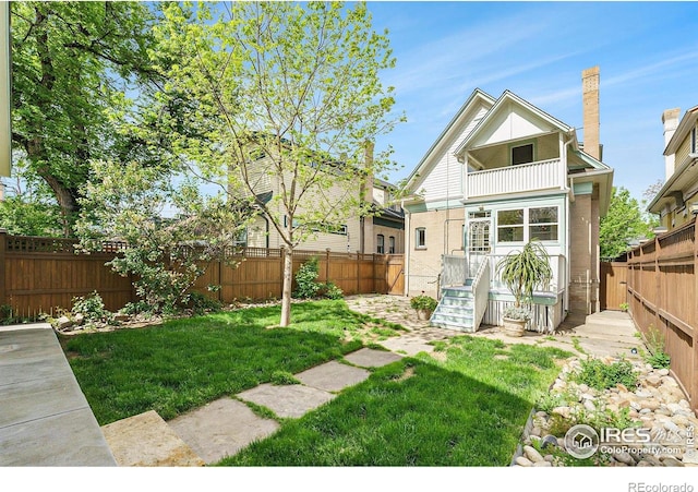 486 N Corona St, Denver, CO 80218 - rear view of property with a balcony and a chimney