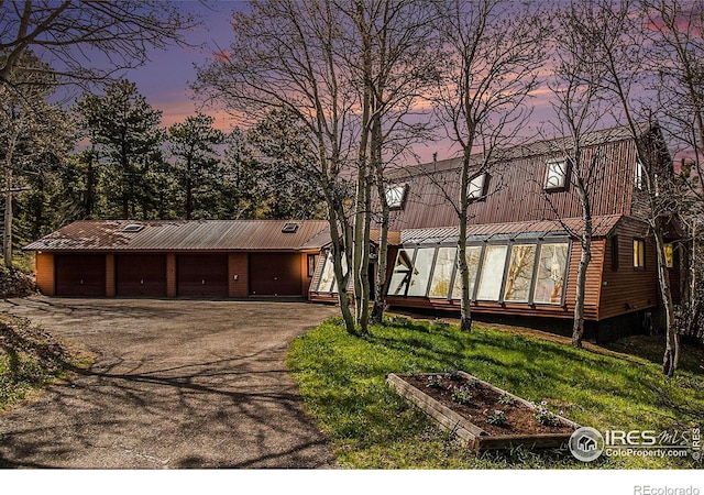 133 Rockledge Cir, Allenspark, CO 80540 - view of front of property featuring a metal roof and a detached garage
